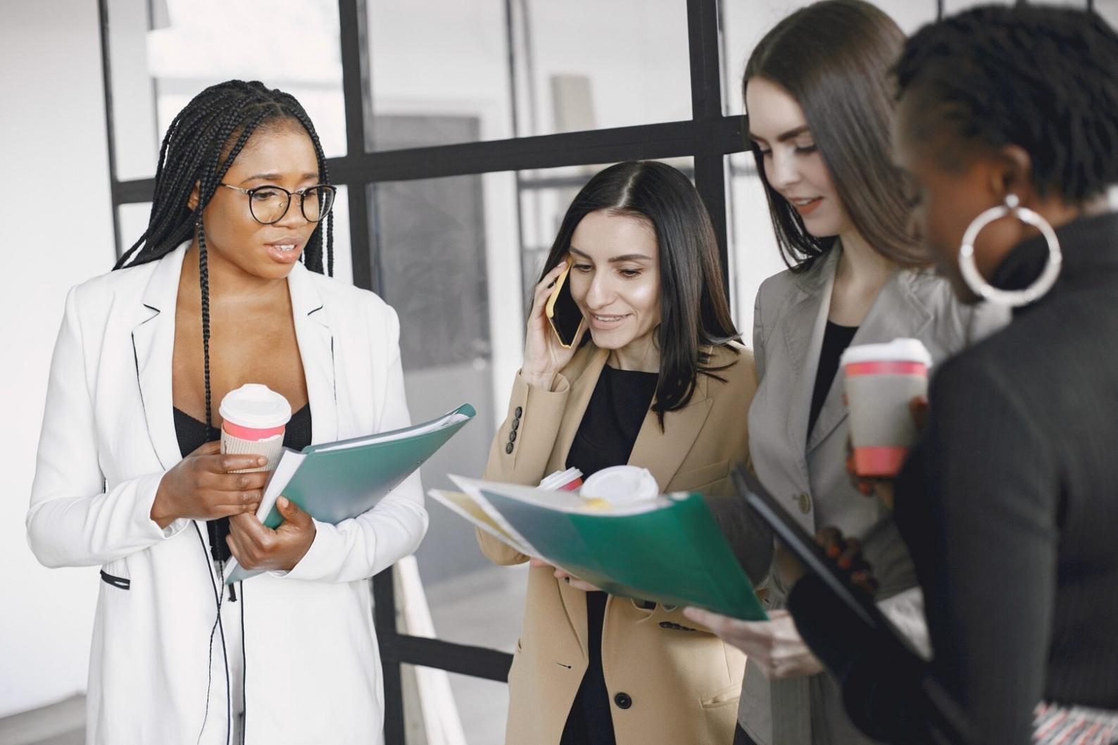 Financial consultant reviewing budget adjustments with client documents